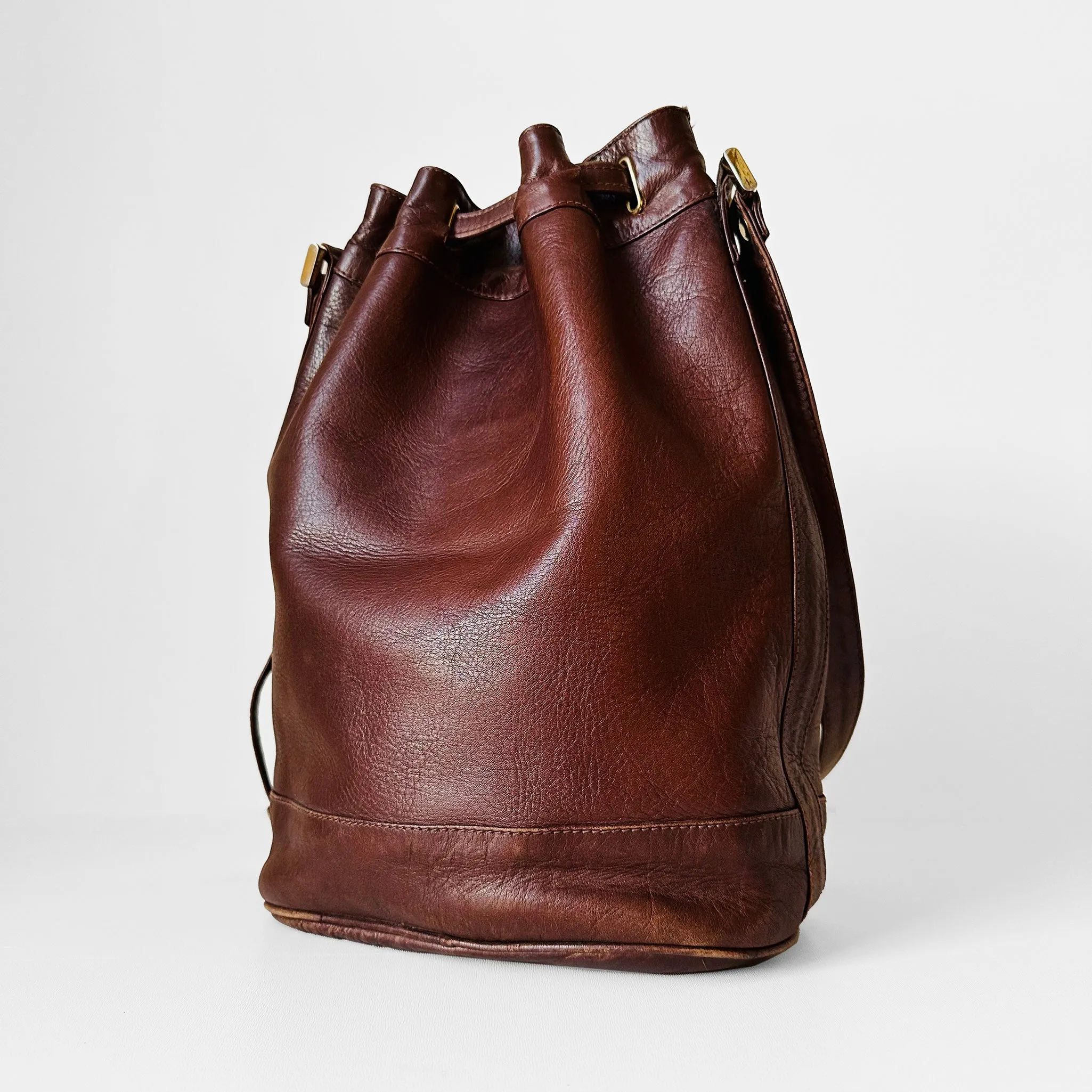 1970s Saddle Brown Buttery Soft Leather Cinch Top Bucket Crossbody Bag