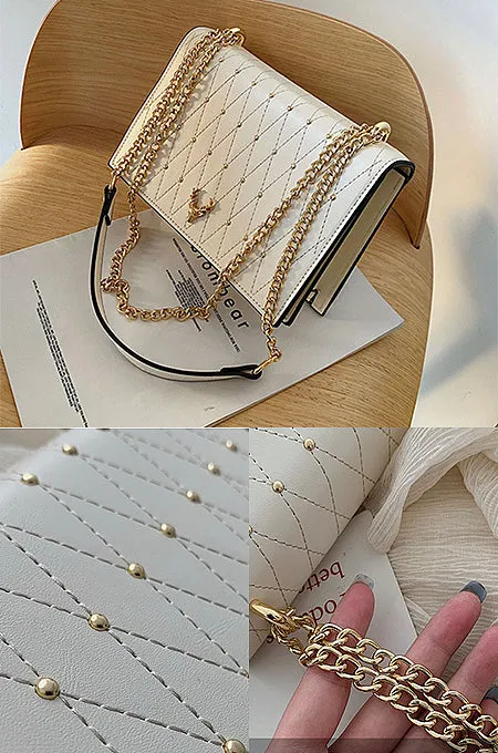 “Caviar Beauty” Leather Crossbody Bag