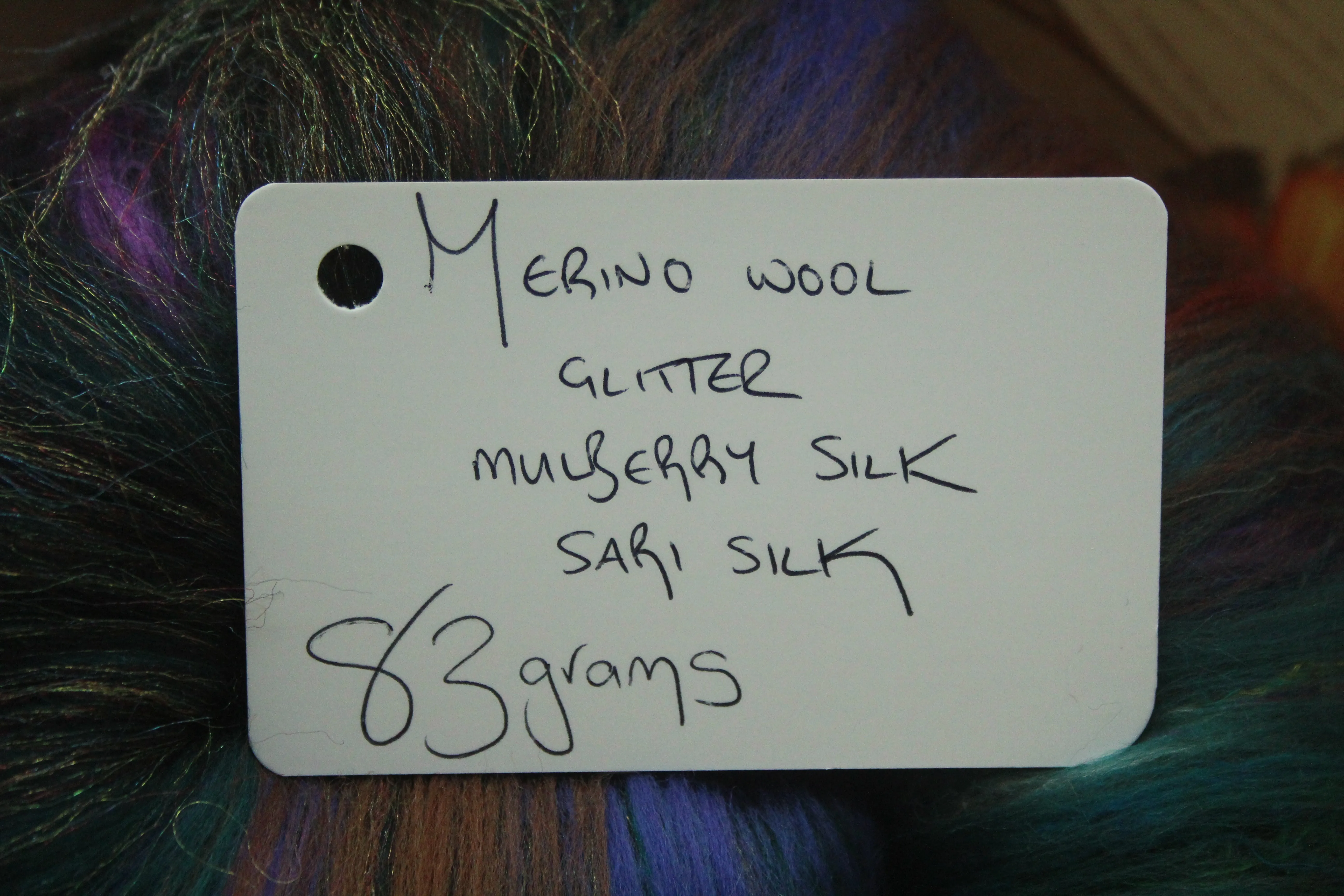 Merino Art Batt  - Black Brown Ultra-violet Green - 83 grams 2.9 oz - Wool for felting, spinning and weaving