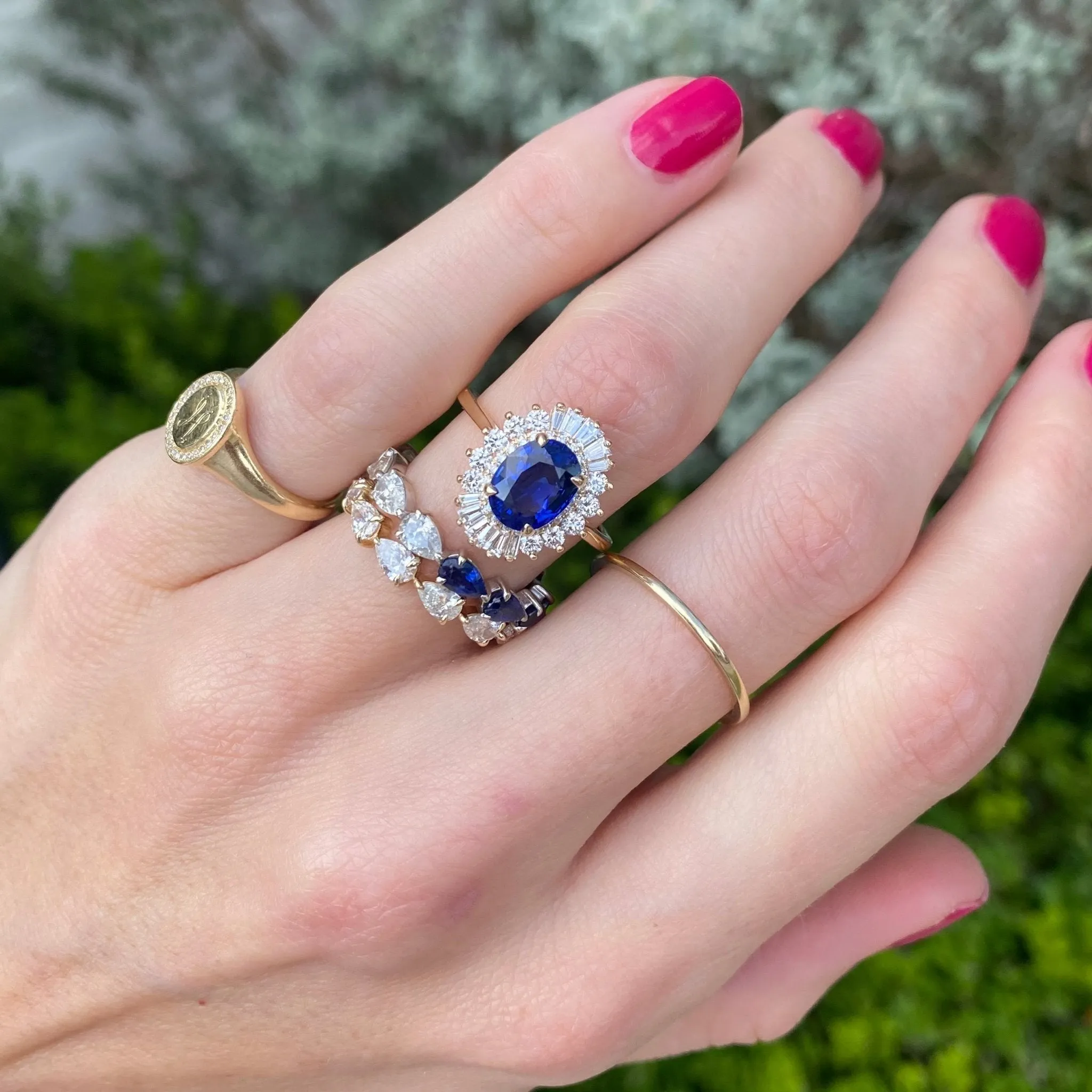 Oval Cut Sapphire with Sunburst Halo