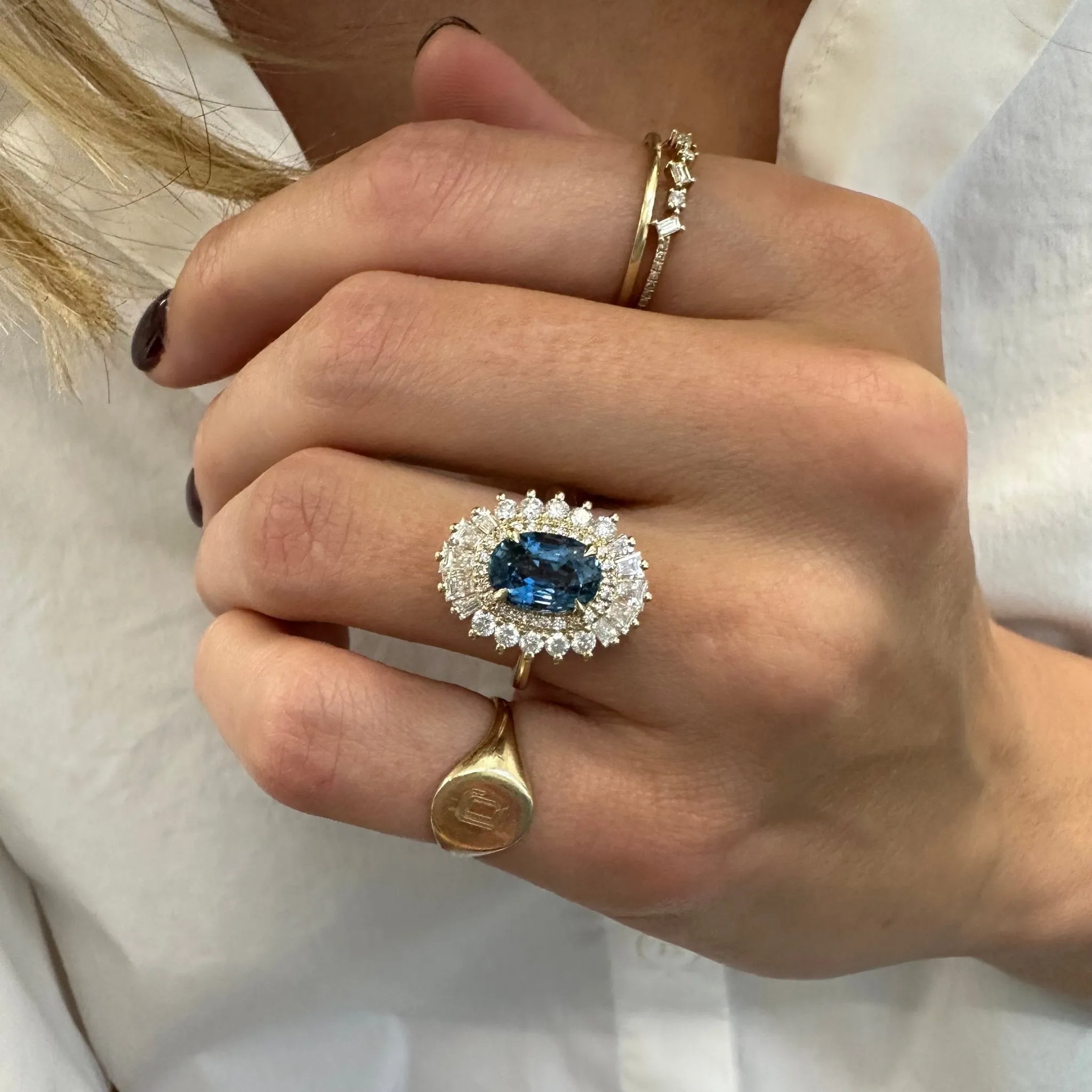 Oval Cut Sapphire with Sunburst Halo